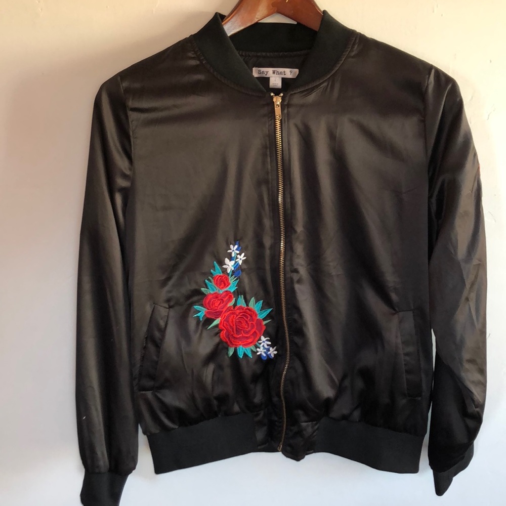 Black satin bomber jacket with embroidered roses.